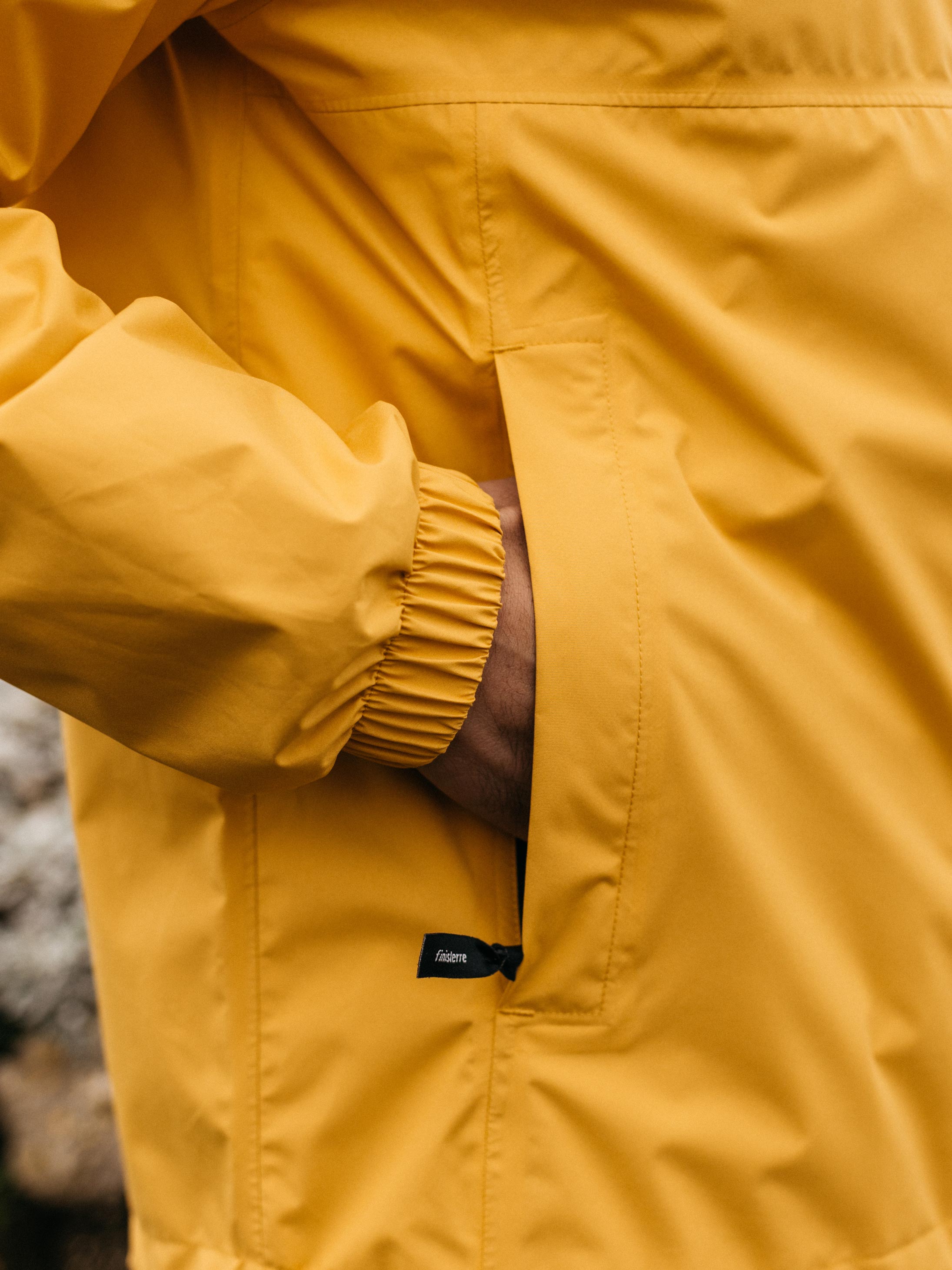 Men Recycled Waterproof Jacket in Orange - Rainbird