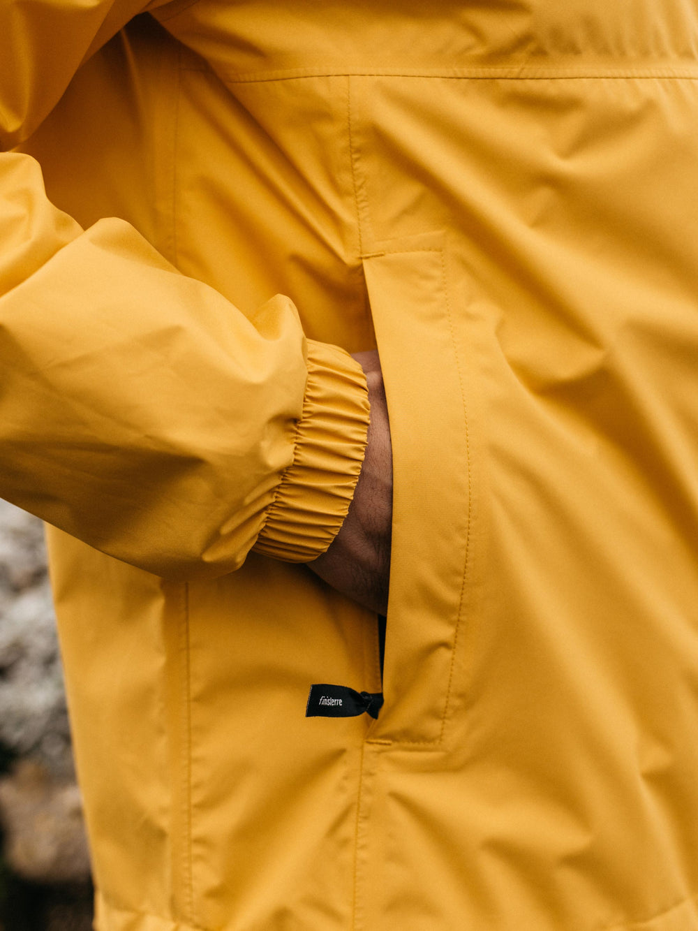 Men Recycled Waterproof Jacket in Orange - Rainbird