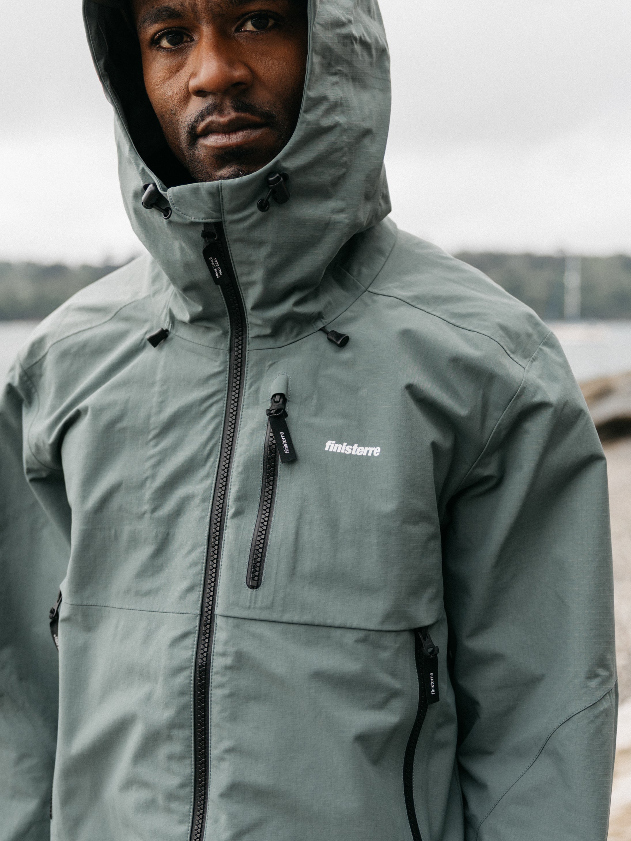 Men Stormbird Waterproof Jacket in Deep Sea