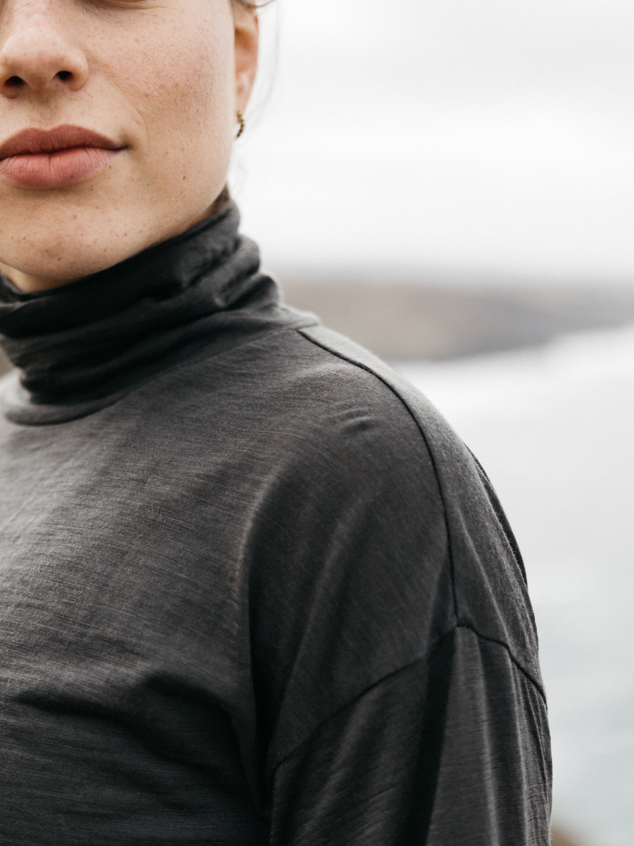 Women Merino High Neck T-Shirt in Raven - Seeker