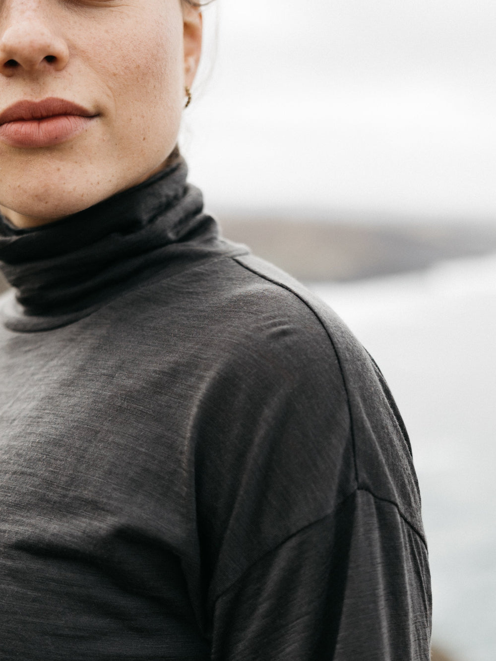 Women Merino High Neck T-Shirt in Raven - Seeker
